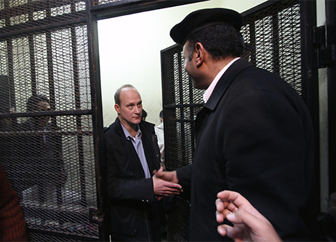 Robert Becker leaves the defendants' cage after a hearing in the trial of employees of nonprofit groups in Egypt / AP