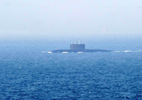 A Chinese Navy submarine sails back to a naval port in Qingdao city / AP