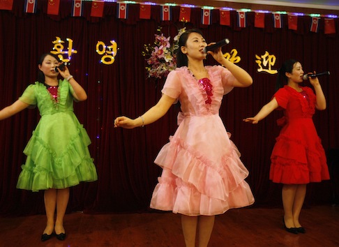 North Korean women sing at a North Korean restaurant in Dandong, China / AP