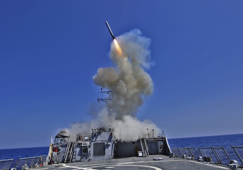 The guided-missile destroyer USS Barry launches a Tomahawk cruise missile / AP
