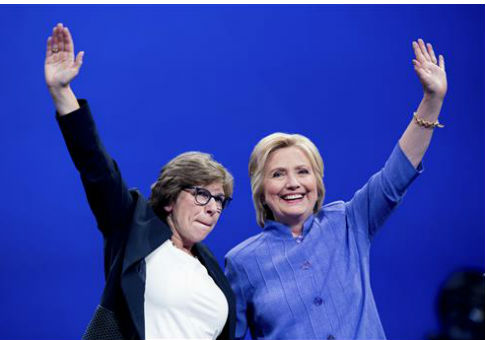 Hillary Clinton with AFT President Randi Weingarten, left / AP