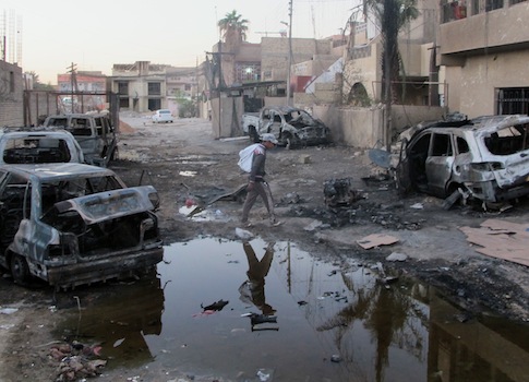 A car bomb's aftermath after an October 2013 attack in Baghdad