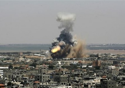 An Israeli missile explodes on impact in Rafah, southern Gaza Strip, on Tuesday, July 8