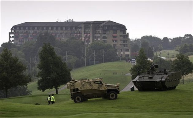 Military vehicles showcased on the grounds of the Celtic Manor Resort / AP