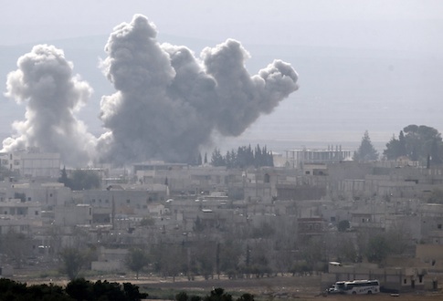 Smoke rises from the Syrian town of Kobani Oct. 14