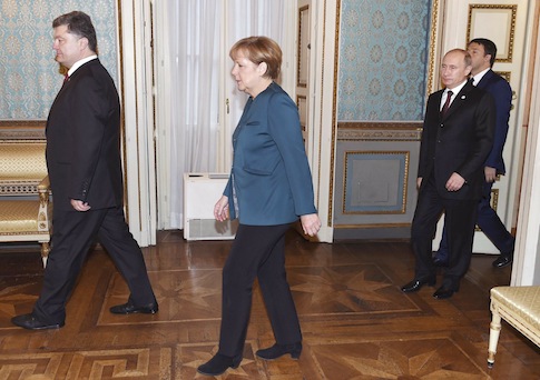 Ukraine's President Petro Poroshenko, German Chancellor Angela Merkel, Russia's President Vladimir Putin and Italy's Prime Minister Matteo Renzi arrive for a meeting on the sidelines of a Europe-Asia summit (ASEM) in Milan October 17