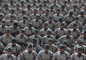 Iranian navy members march in a parade marking National Army Day