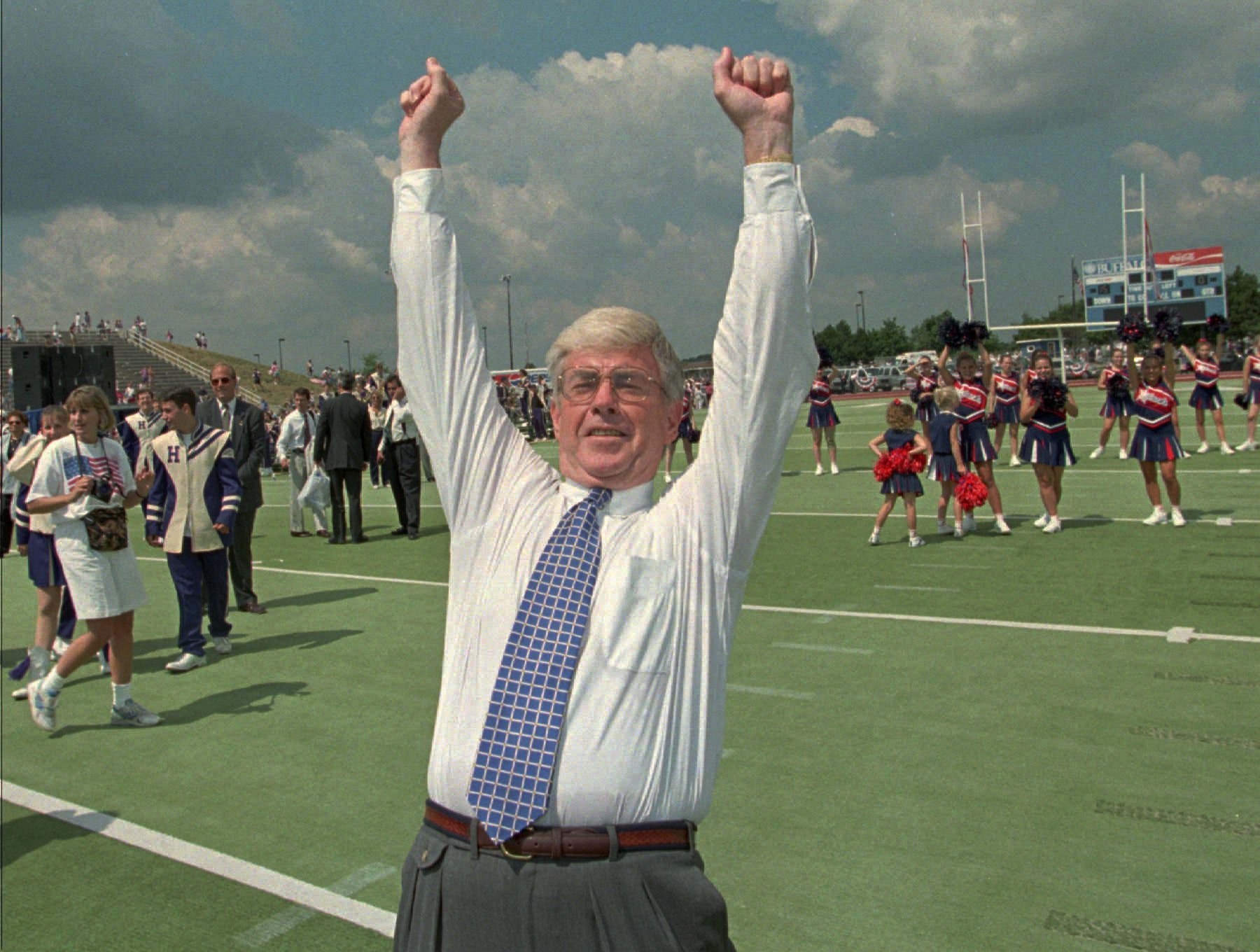 Republican vice presidential candidate Jack Kemp celebrates a pass completion to his former Buffalo Bills teammate, tight end Charlie Ferguson, during a campaign rally with Bob Dole Sunday, Aug 18, 1996, at the old football stadium on the State University of New York campus at Buffalo, N.Y.  (AP Photo/Bill Sikes)