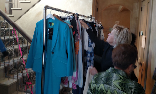 Ladies rummage through Wendy Davis' clothes / Brent Scher