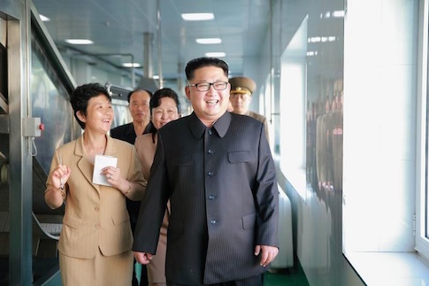 North Korean leader Kim Jong Un gives field guidance to the newly built Ryugyong Kimchi Factory in this undated photo released by North Korea's Korean Central News Agency (KCNA)