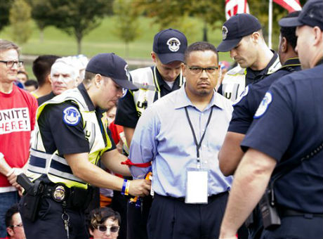 Rep. Keith Ellison (D., Minn.) arrested by U.S. Capitol Police on Capitol Hill during immigration rally in Washington, Oct. 8, 2013 / AP