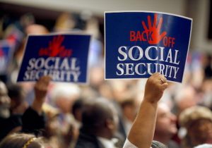 Social Security supporters attend a rally