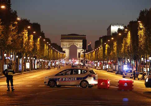 Police secure the Champs Elysee Avenue after one policeman was killed and another wounded in a shooting incident in Paris