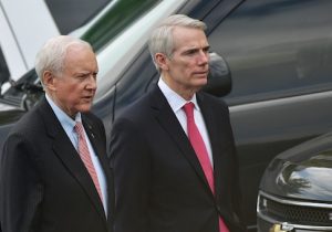 Senators Orin Hatch and Rob Portman are seen on West Executive Drive after a briefing for US senators on the situation in North Korea in the Eisenhower Executive Office Building