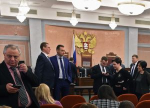 Participants attend a hearing on the justice ministry request to ban the Jehovah's Witnesses at Russia's Supreme Court in Mosco