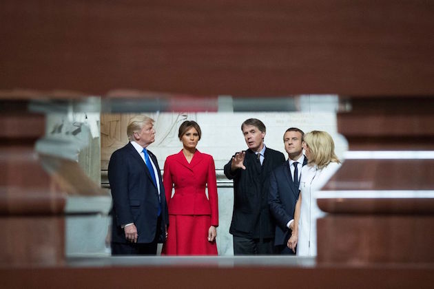 US President Donald Trump, First lady Melania Trump, French President Emmanuel Macron, and his wife Brigitte Macron listen to the Director of the Army Museum, David Guillet, as they visit Napoleon Bonapartes tomb at Les Invalides in Paris, on July 13 