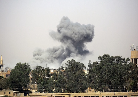 Smoke billows in Raqa's western al-Darya neighborhood