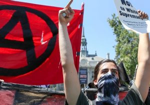 Antifa members and counter protesters gather during an event at Martin Luther King Jr. Park in Berkeley, Calif. / Getty Images