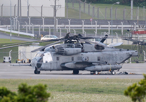 The window location of a CH-53 helicopter is seen covered at Futenma US Marine Corps Air Station in Ginowan, Okinawa prefecture
