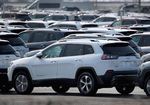 Jeep Cherokees sit on a lot at Fiat Chryslers's Belvidere Assembly Plant