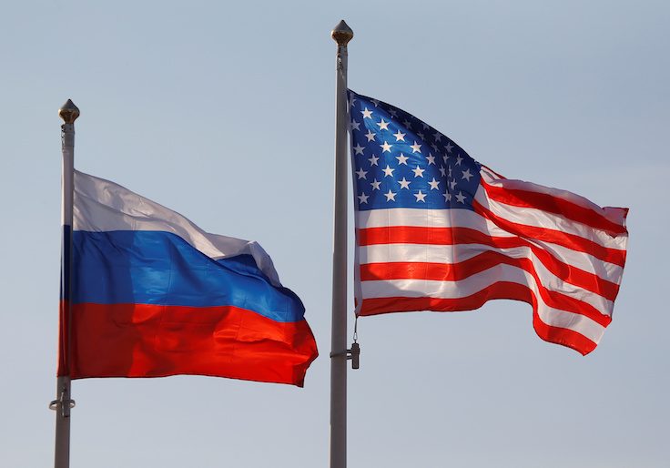 National flags of Russia and U.S. fly at Vnukovo International Airport in Moscow
